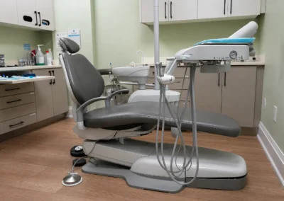 Revive Dental Clinic Machinery at Revive Dental Mississauga featuring a modern dental chair, treatment instruments, equipment, and organized cabinetry in a clinical treatment room.